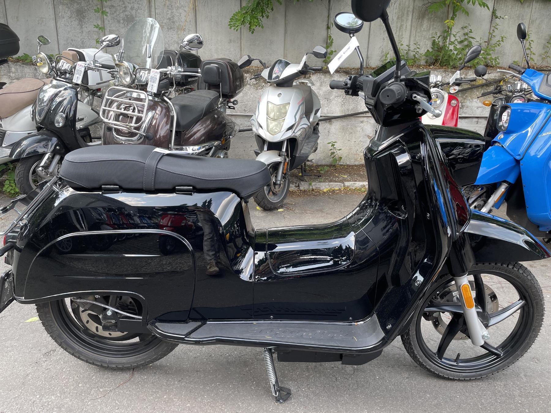 k.A. Bis zu 100 KM Reichweite bei zwei Akkus